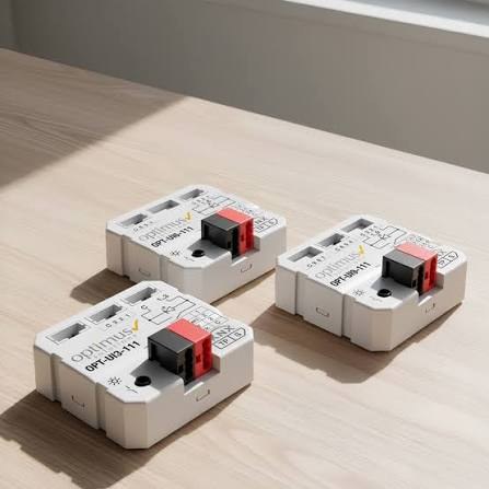 Three smart relay modules on a desk